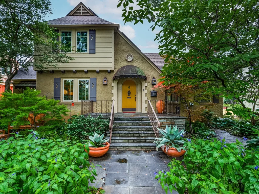 The 1930s Tudor is located in the heart of the Kessler Park Conservation District,