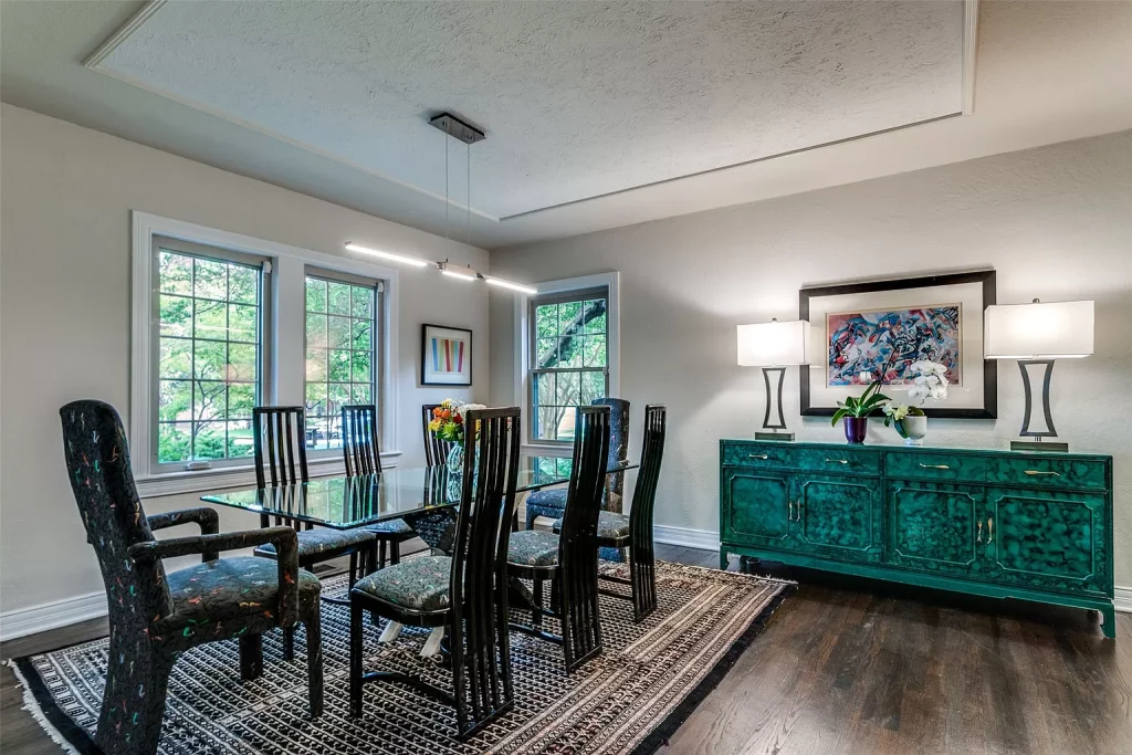 A window-lined dining room.