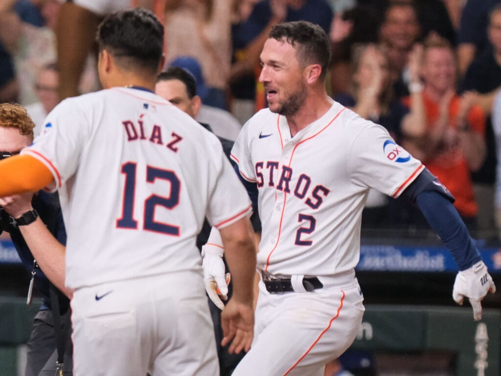 Third baseman Alex Bregman and catcher Yainer Diaz help keep this Astros pitching staff together. (Photo by F. Carter Smith)