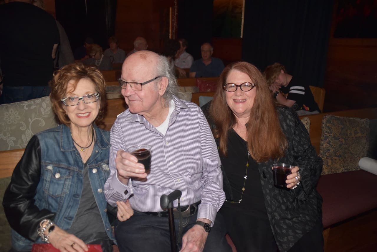 Anya Tish, artist H.J. Bott and arts writer Donna Tennant celebrate after a gallery opening.