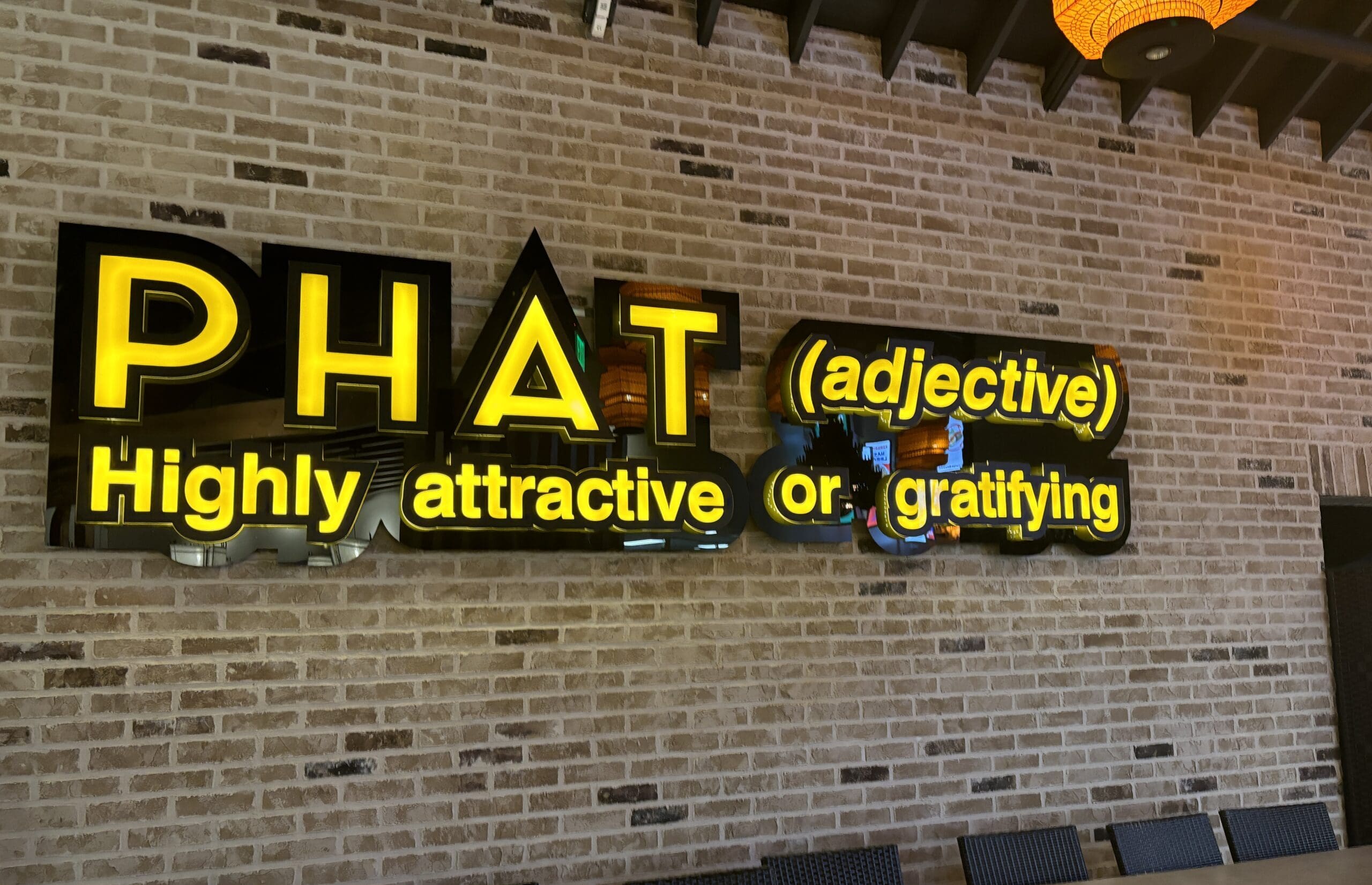 Phat Eatery's signature signage inside lets diners know what to expect. (Photo by Laura Landsbaum)
