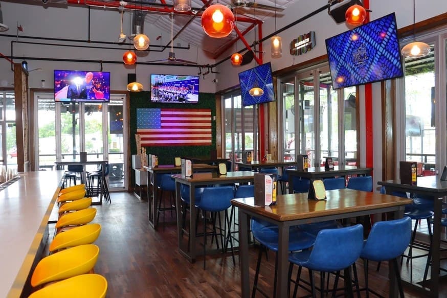 Moonshine Deck in Magnolia is the perfect place to gather for this summer's sporting spectacle. Image: Moonshine Deck.