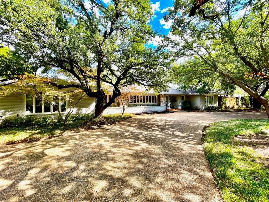 The newly listed 6219 Joyce Way was home to legendary Dallas real estate agent Della Lively for 50 years.  (Photo by Douglas Newby & Associates)