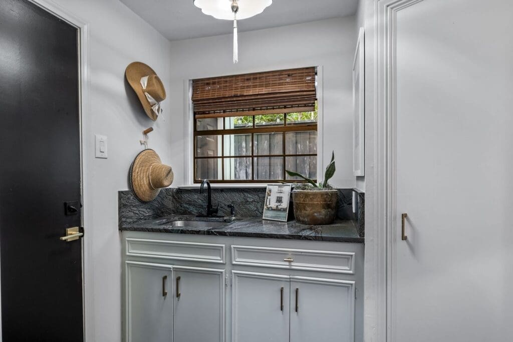 The mudroom features a pendant from Anthropologie.