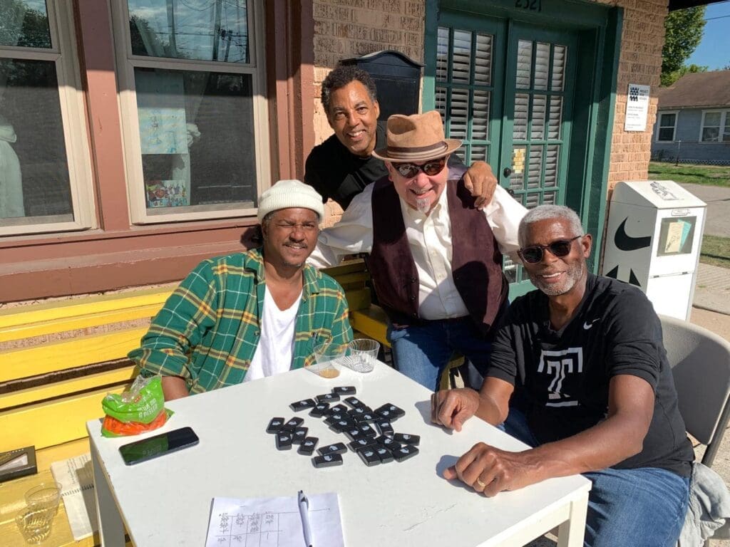 Artists Angelbert Metoyer, Rick Lowe, Ernesto Leon and the late Floyd Newsum played a game of dominos at Project Row Houses. Lowe and Newsum co-founded Project Row Houses with five other artists in 1993. (Photo by Ernesto Leon)