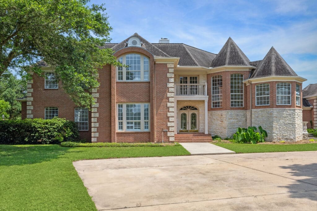 A spread of almost four acres at 2403 San Miguel in Friendswood is large enough for a double stall horse barn and room for riding. (Photo by TK Images for Compass)