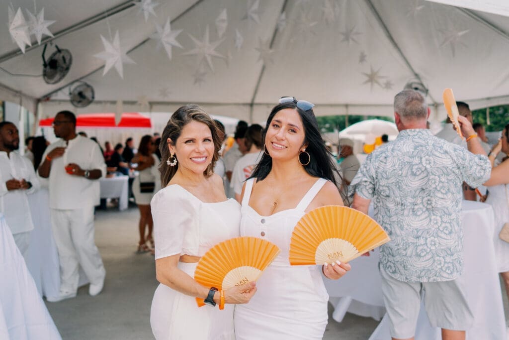 Guest, Cony Mora at Nan & Company Properties' White Linen Night in The Heights soirée
