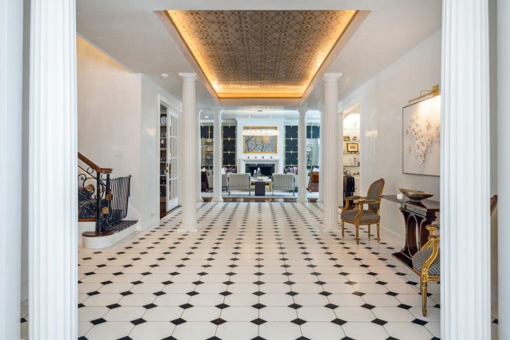 Doric columns provide a regal ambience to the residence at 2411 River Oaks Boulevard. (Photo by TK Images for Compass)