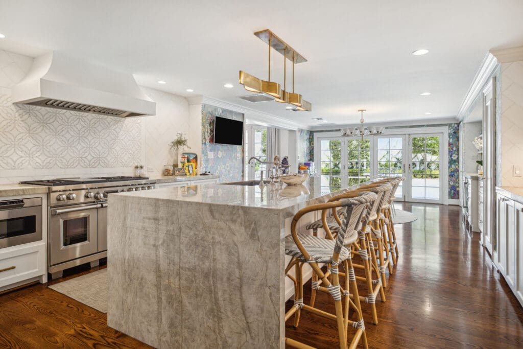 The gourmet island kitchen in the former River Oaks home of Gov. John B. Connally Jr. (Photo by TK Images for Compass)