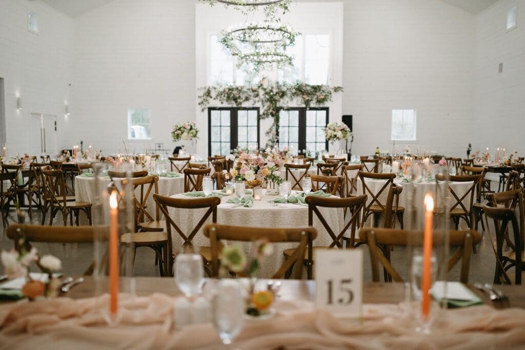 The Addison Woods reception hall can comfortably seat 220 guests in the light, airy space. (Rachel Lynn Photography)
