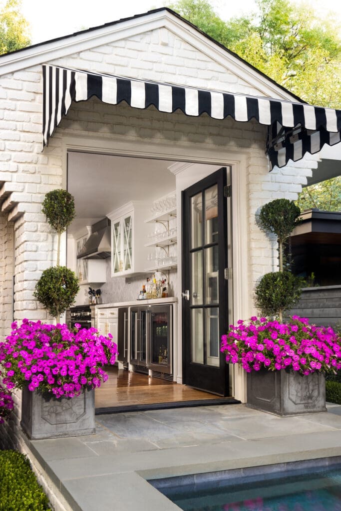 Pennoyer Newman topiary planters line the kitchen door entrance. (Photo by Jennifer Baker)
