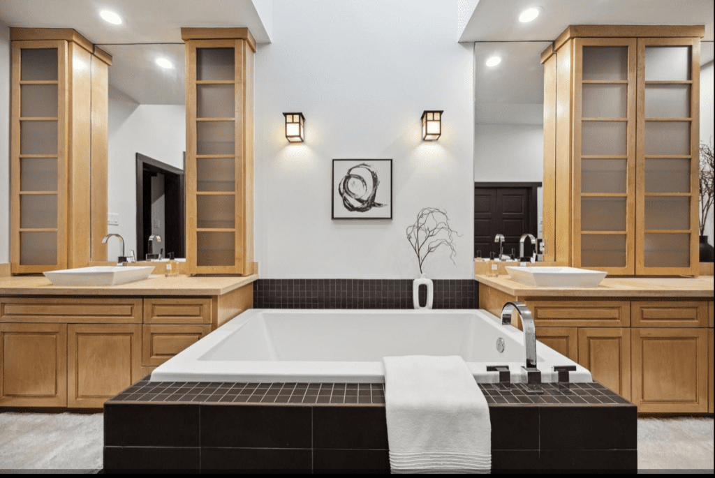 The soaking tub at 5318 Holly Street in Bellaire is perfect for that post -Olympic class workout soak. Don't forget the ice. (Photo by TK Images for Compass)
