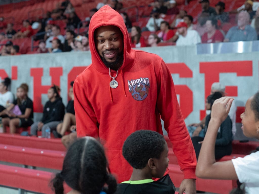 University of Houston power forward J'Wan Roberts is always willing to give picture-seeking kids a moment. (Photo by F. Carter Smith)