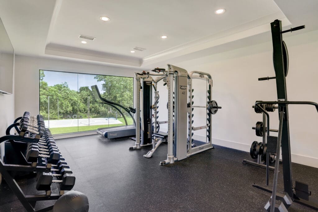 The workout room at 6650 Whitehill in Richmond, Texas (Photo by HDR Photography for Compass)