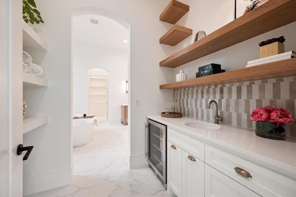 The master bath has its own coffee and cocktail bar.