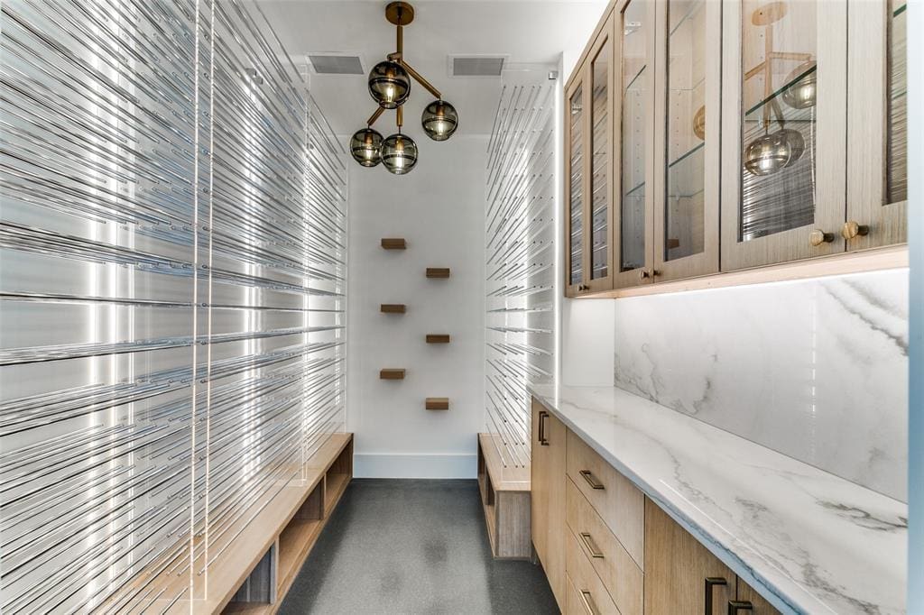 The walk-in temperature-controlled wine room.