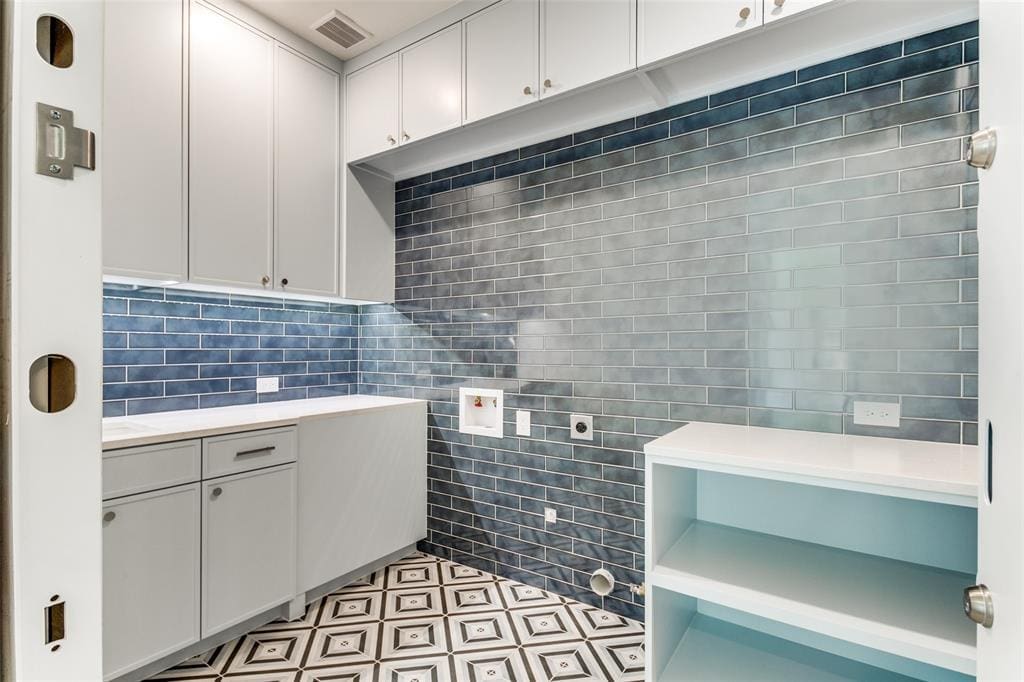 One of three laundry areas. 
