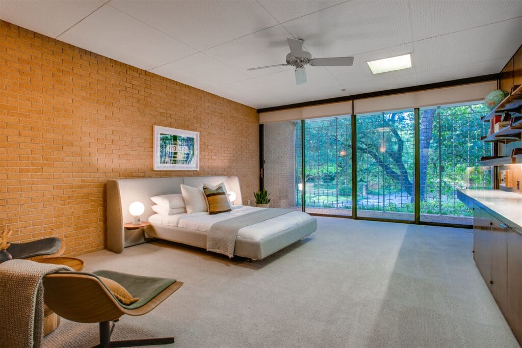 A minimal bedroom in the mid-century Dallas home.