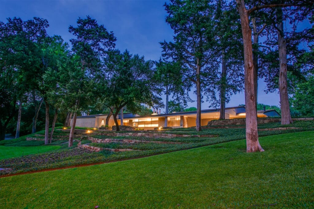 The 6,416-square-foot residence is built on a 2.09-acre lot in Dallas' sought-after Kessler Lake Estates neighborhood.
