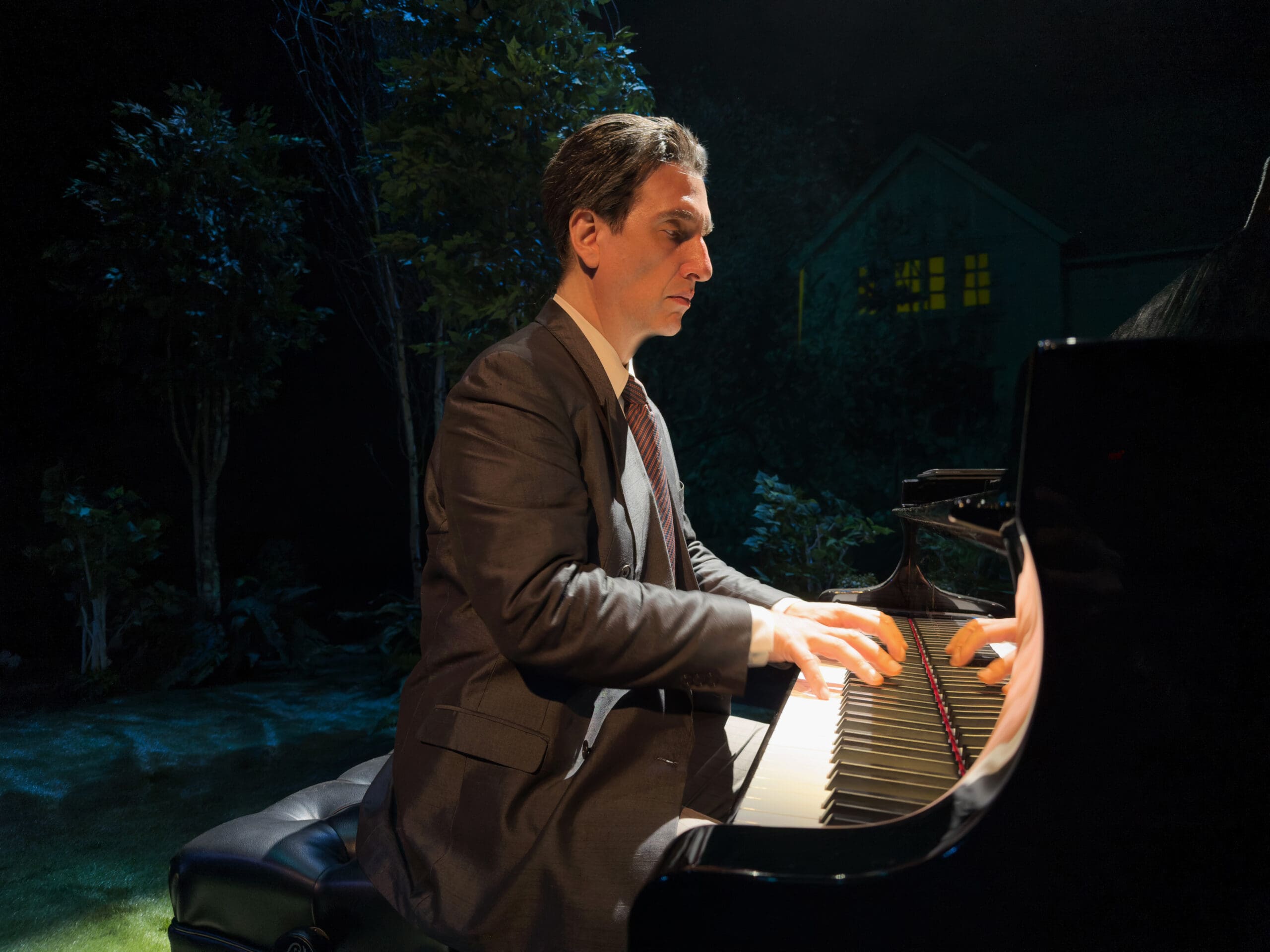 Hershey Felder, as Rachmaninoff, plays piano in <em>Rachmaninoff and the Tsar</em> at Stages Theater. (Photo by Stefano Decarli)