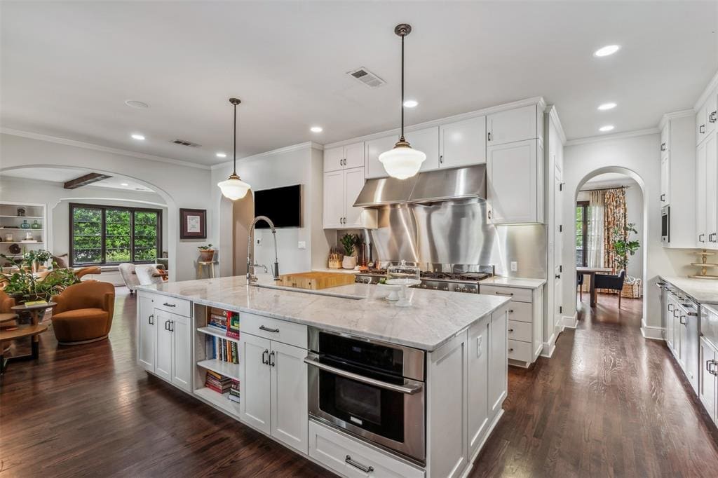 The modern kitchen if rife with commercial appliances. (Photo by Norman & Young - Compass)