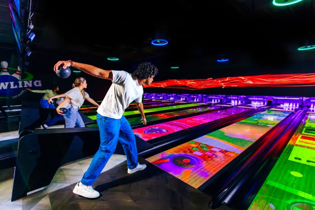 Your lane comes alive in Spark Bowling.