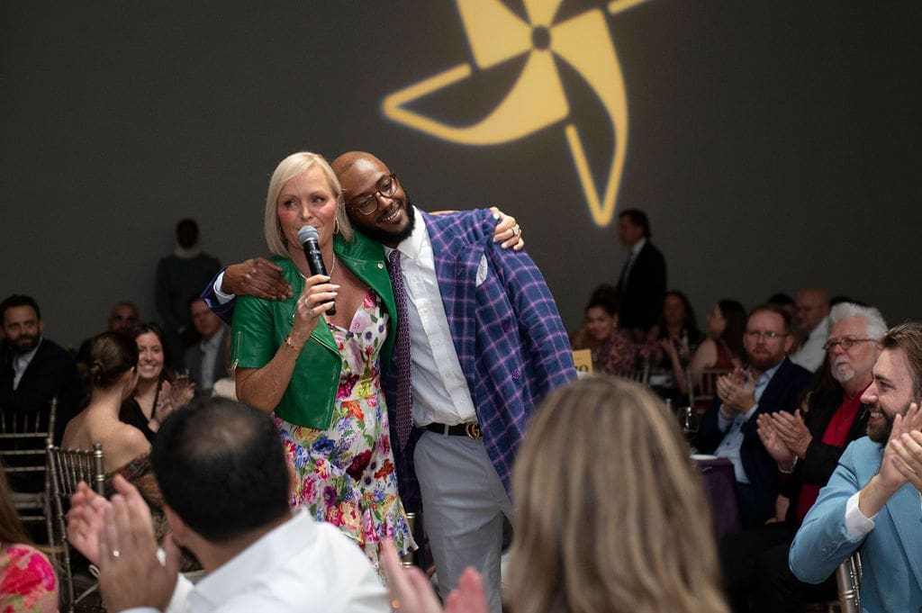 Auction Host Letitia Frye with Curatorial Chair Brandon Harris (Photo by Tamytha Cameron)