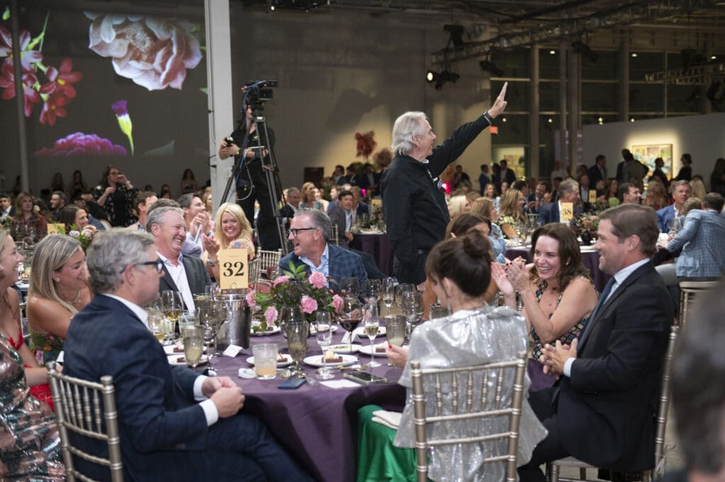 Guests of Lindy Berkley and Kacy Tolleson during the live auction (Photo by Tamytha Cameron)