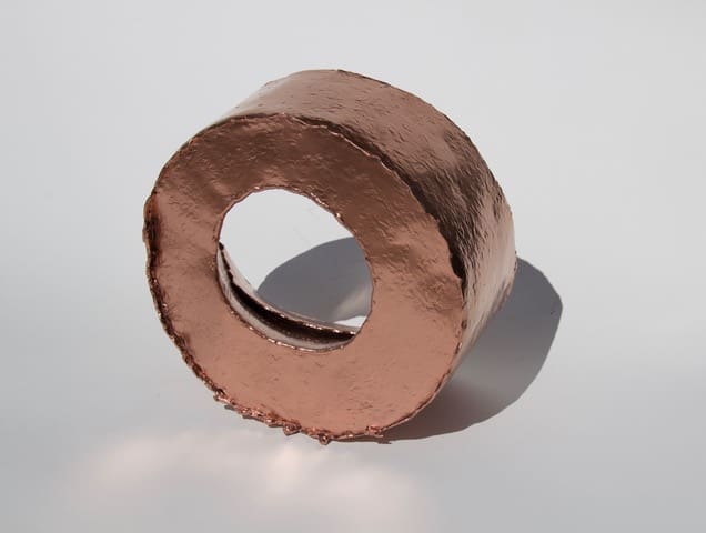 Tara Conley's "Take Aim," 2024, bends aluminum to create a captivating, fluid sculpture, showcasing at ELLIO Fine Art. 
