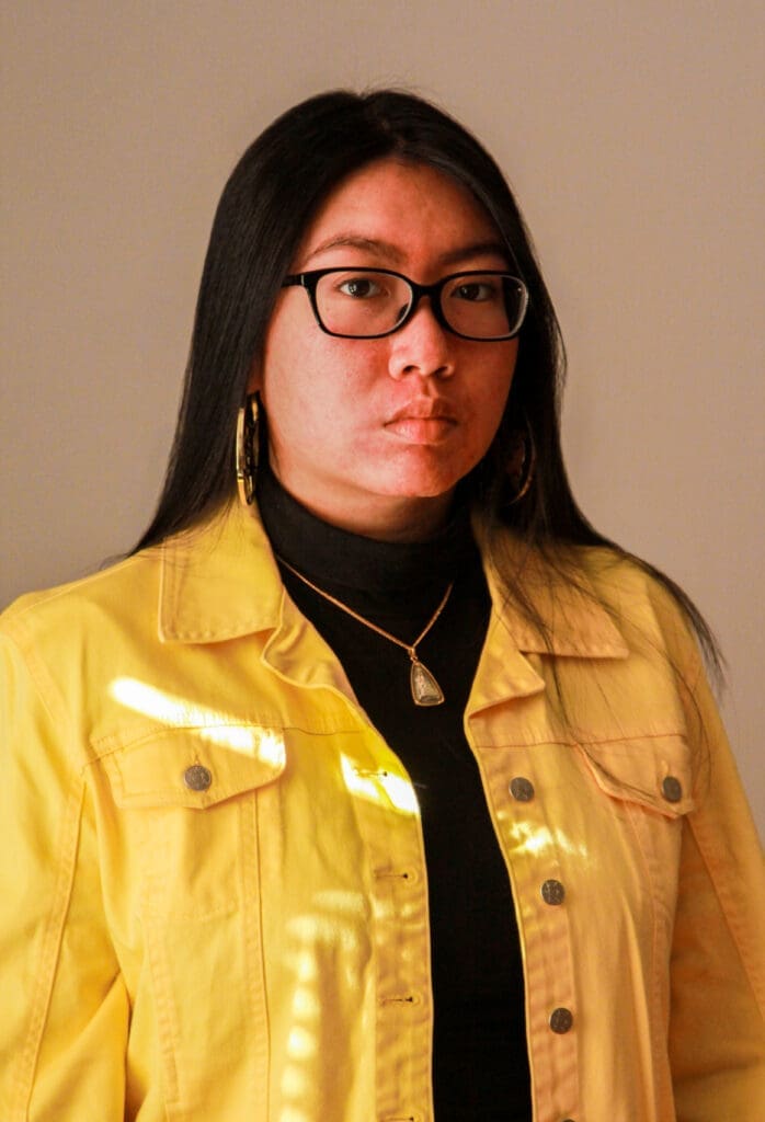 Meta4 alum Alinda "Adam" Mac is the assistant coach of the award-winning youth slam poetry team (Photo courtesy of Adam Mac)