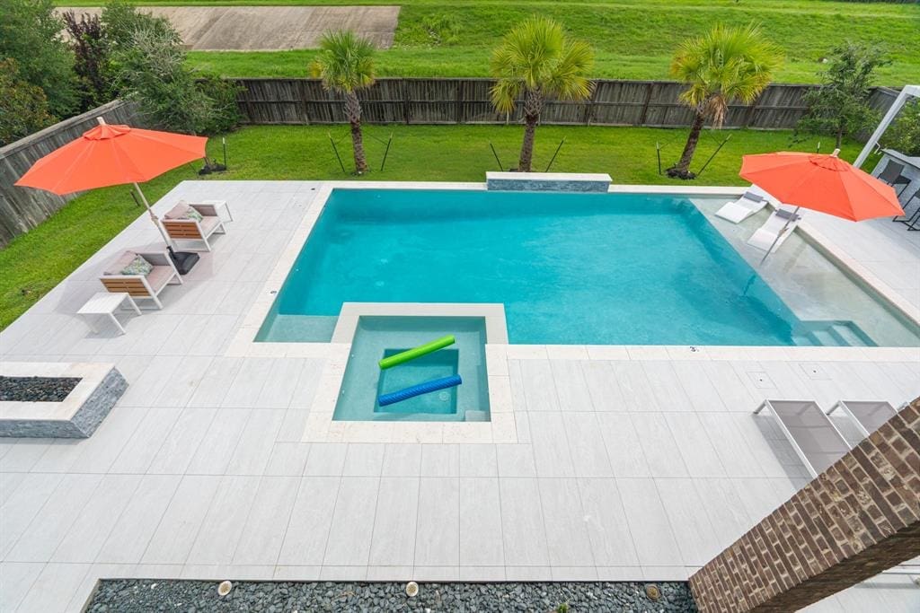 The contemporary swimming pool design is one of the home's main perks. Enjoy this space for years to come. 