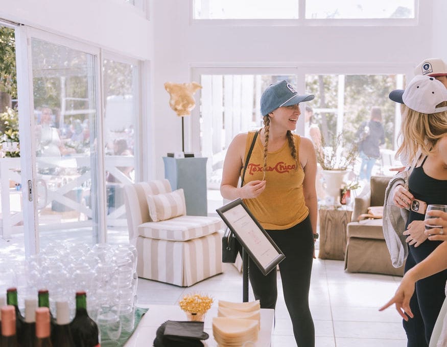 Attendee Erin McGee enjoying the lounge by Alexandra Killion featuring her new line, AK Collective at PaperCity's Nourish retreat. (Photo by Heather Robards)