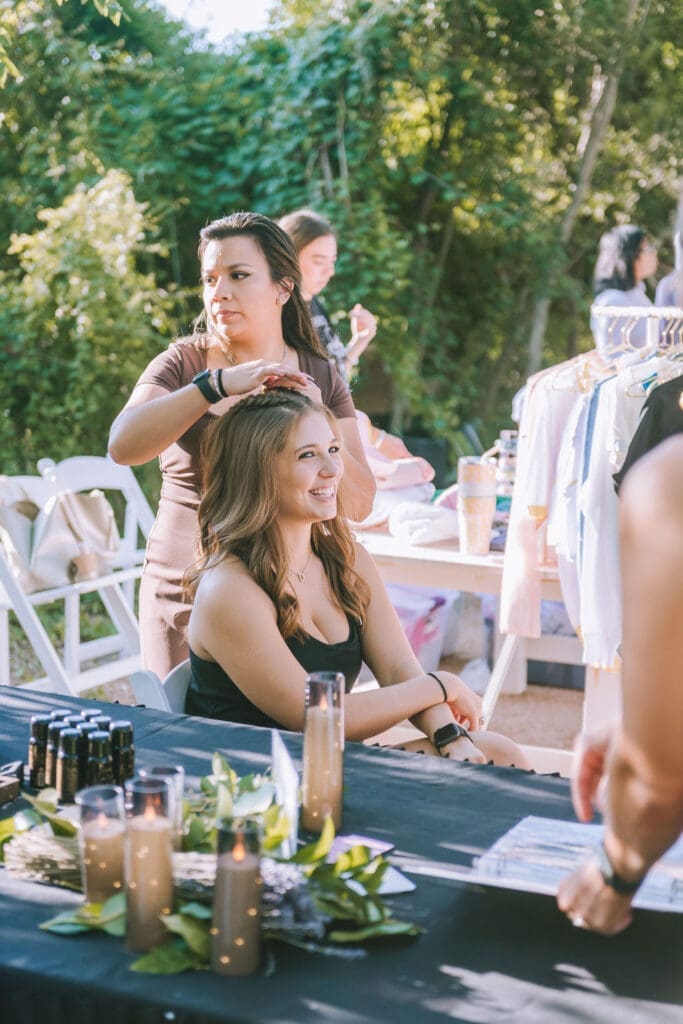 Volume Social's Gabby Camacho created intricate braids for attendees at PaperCity's Nourish retreat. (Photo by Heather Robards)