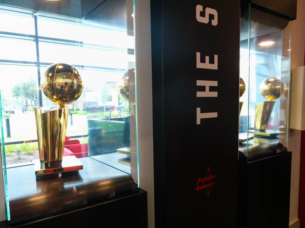 The Houston Rockets' two championship trophies are displayed in the lobby of the franchise's new state of the art training center. (Photo by F. Carter Smith)