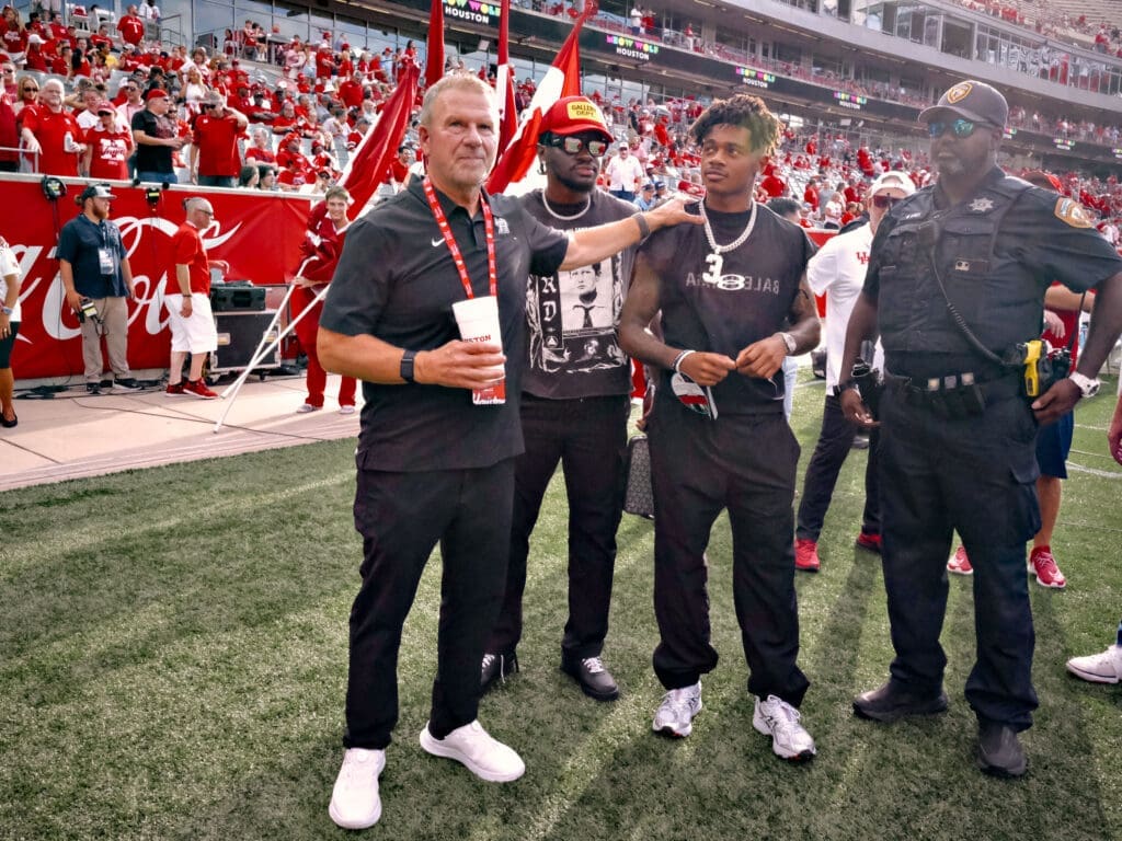 Tilman Fertitta knows that Tank Dell has the right kind of Cougar swagger. (Photo by F. Carter Smith)