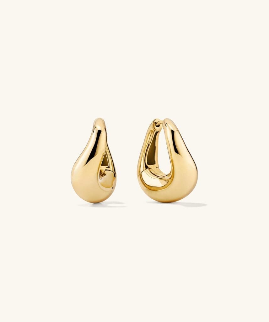 The Dôme Figure Hoops are elegant, long-wear earrings, with proceeds supporting programs that empower women and non-binary individuals. (Photo courtesy Mejuri)