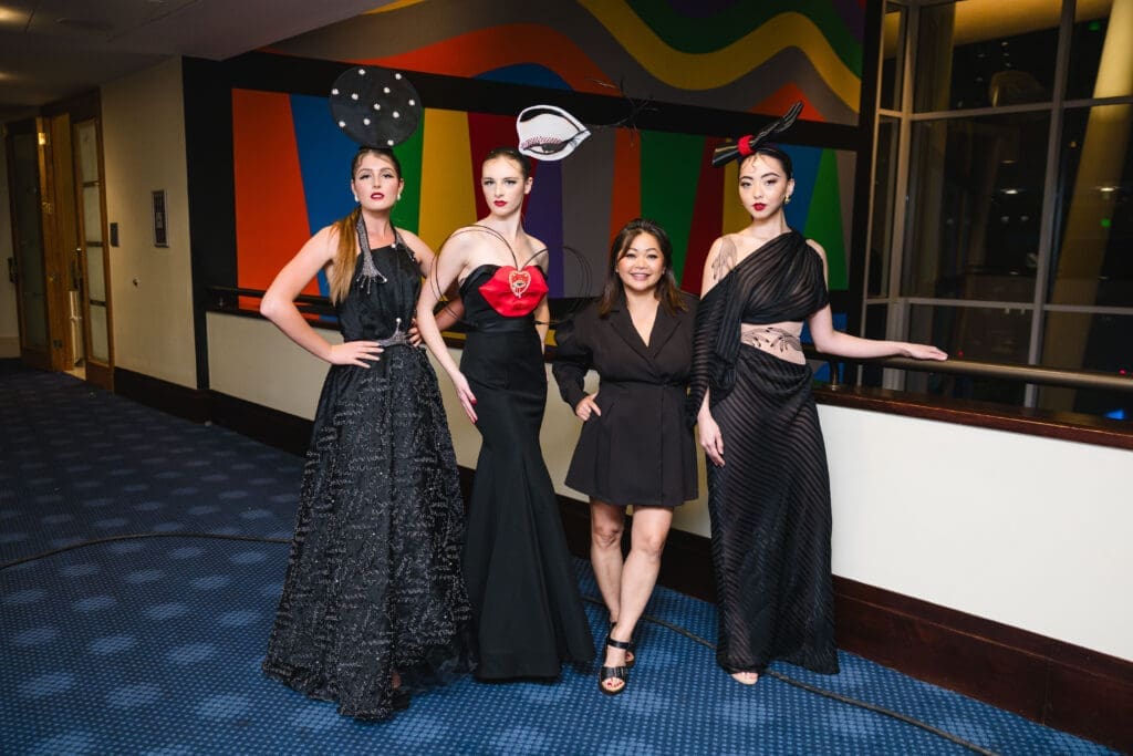 Designer Chloe Dao with her models at Houston Arts Alliance 2024 The World’s Stage Gala at the Hobby Center. (Photo by Johnny Than)