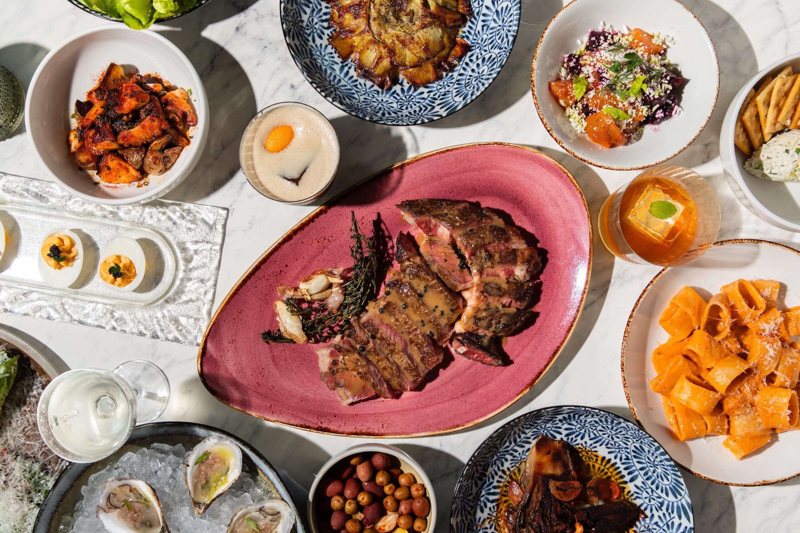 Dining Spread at Maven at Sawyer Yards (Photo by Becca Wright)