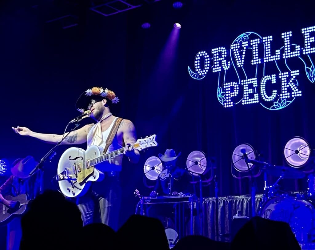 Fans were so close to the folksy, brokenhearted singer, one attendee joked Orville Peck might see him from the crowd and fall in love with him at House of Blues Houston.