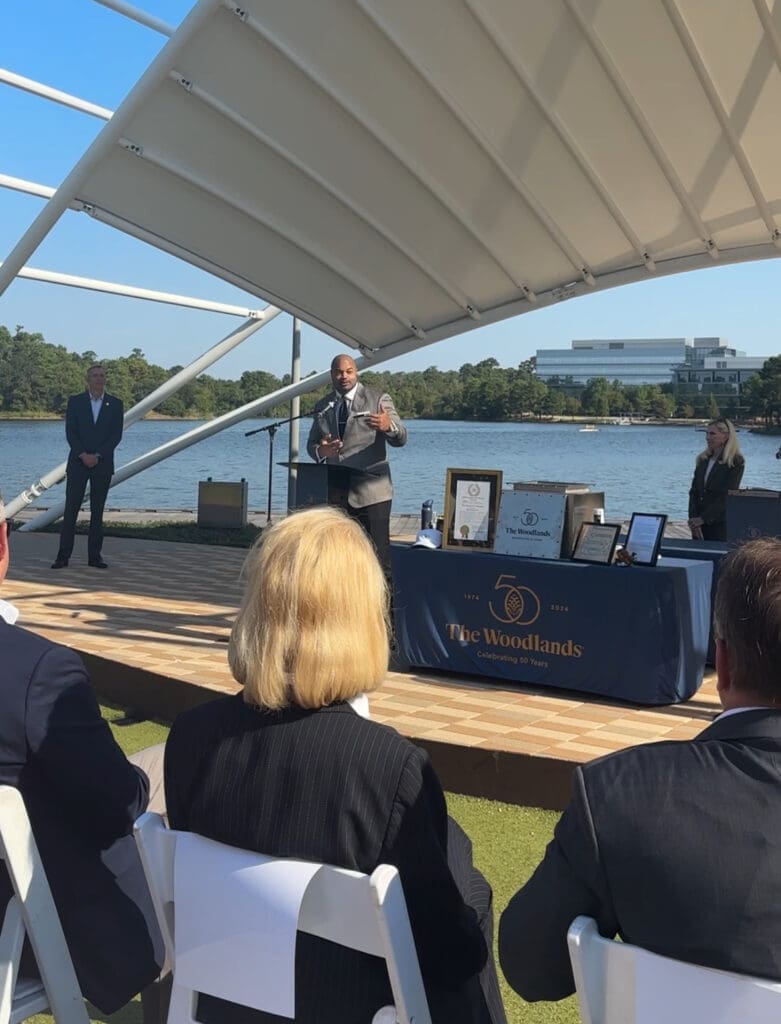 The Woodlands' Grant Irons spoke about the importance of growing up in The Woodlands during the time capsule dedication at the Hughes Landing bandshell. (Photo by Laura Landsbaum)