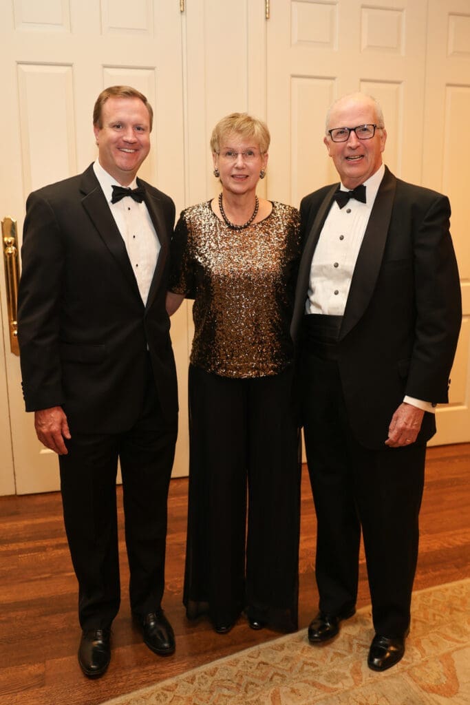 Tommy McClelland, Lynn & John Elsenhaus at 'An Evening for Rice's Honor.' (Photo by Priscilla Dickson)