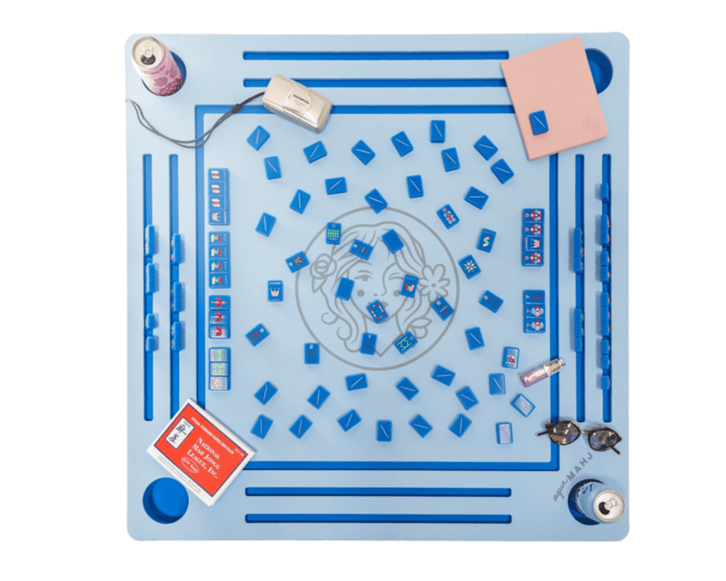 The Floating Mahjong Table adds fun to poolside gatherings with its waterproof design and vibrant style. (Photo courtesy The Mahjong Line)