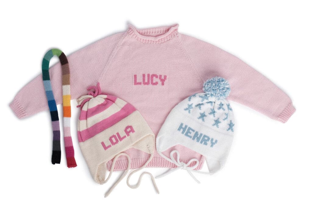 The Name Sweater is a cozy, custom-knit piece featuring personalized lettering for a sentimental touch. (Photo courtesy Madre Dallas)
