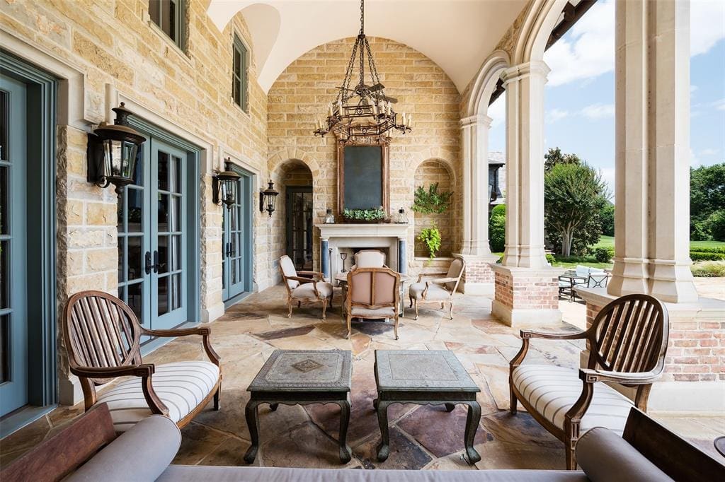 Outside, 10540 Lennox Lane features a pool, spa, fire pit, ponds, and a water well. (Courtesy)