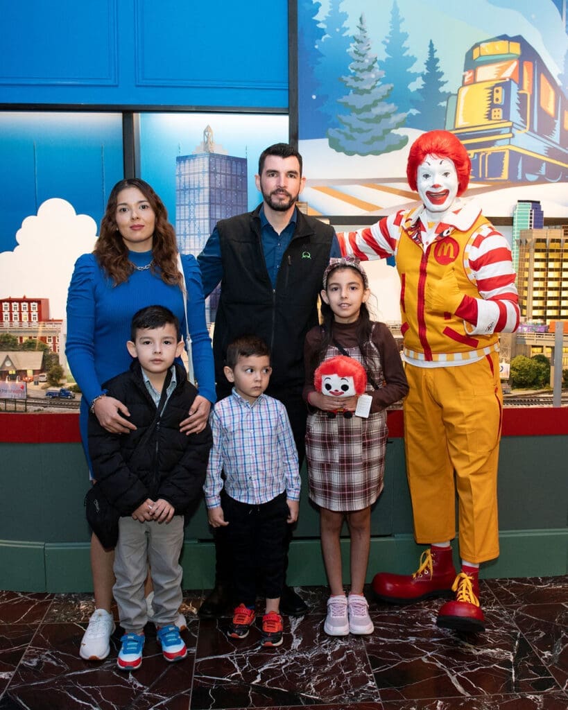 The Andrade Family and Ronald (Photo by Tamytha Cameron Photography)