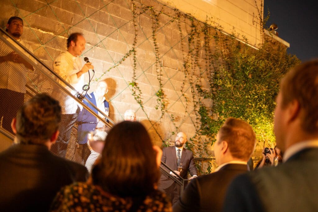 A beaming Chef Luis Roger speaks at the evening celebrating BCN Taste & Tradition's celebration of 10 years and a Michelin star.