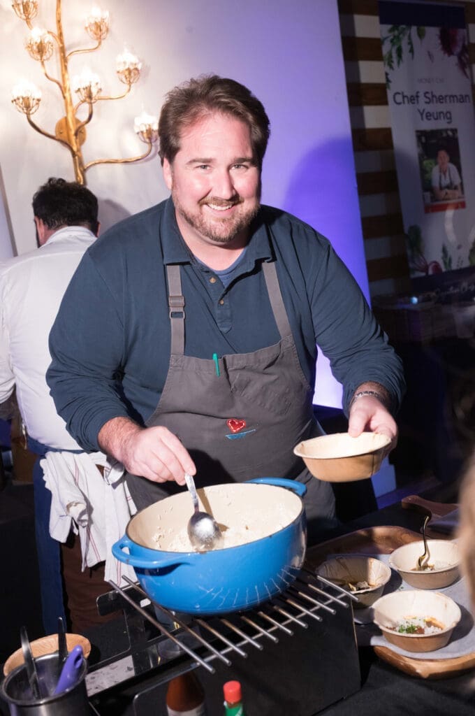 Eunice Chef Drake Leonards serving one of his famed Cajun-inspired dishes (Photo by Daniel Ortiz)