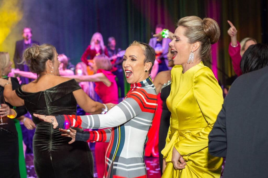 Evelyn MacLean, Agata Bielicki dancing to Skyrocket at the British American Foundation of Texas gala (Photo by Jacob Power)