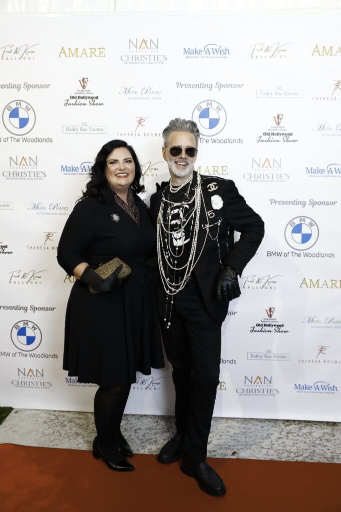 A Make-A-Wish official and emcee Michael Pearce at Fashion Woodlands in the home of Theresa Roemer.