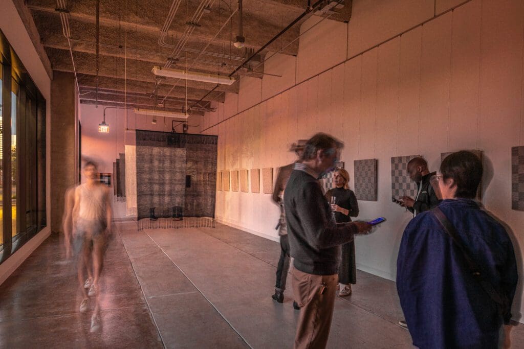 Kristin Marie Bachmann's "At The Still Point [Part 3]" exhibit is awash in red light at sunset at The Ion. (Photo by Paul Hester)